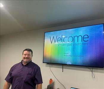 SERVPRO employee in front of screen